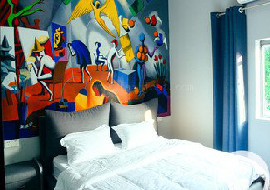 武胜对于酒店的墙体彩绘而言更注重哪些方面？